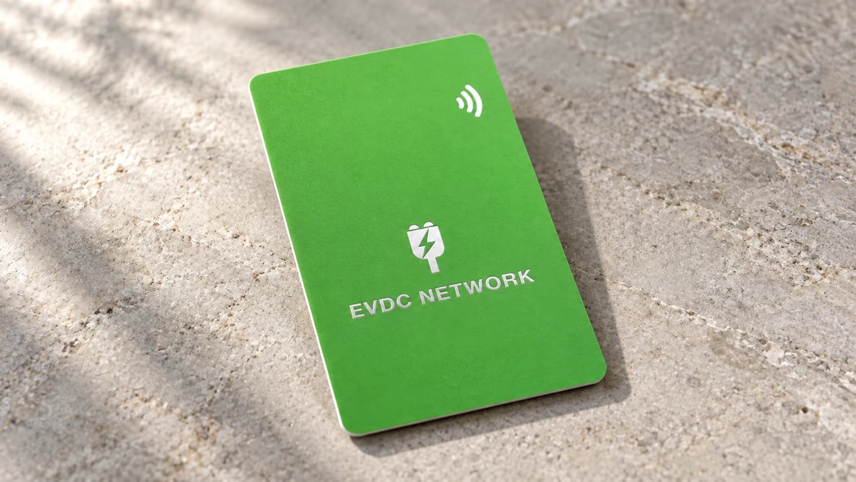Digital rendering of the EVDC Network RFID card on a light stone surface